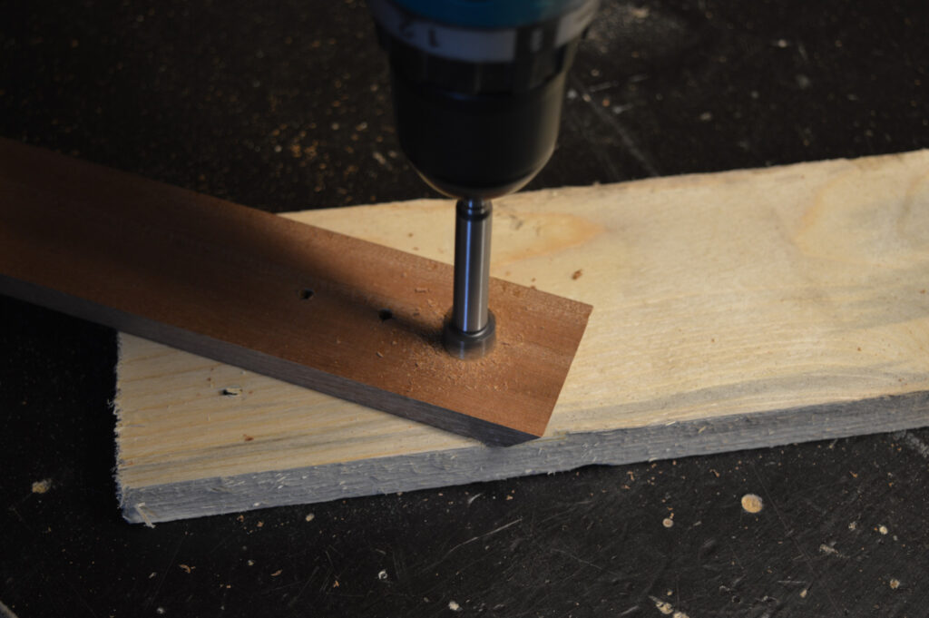 Drilling the button holes in a ClockSquared frame piece