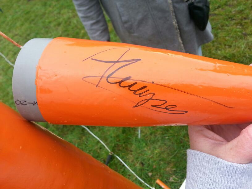 Water rocket nosecone with signature of André Kuipers